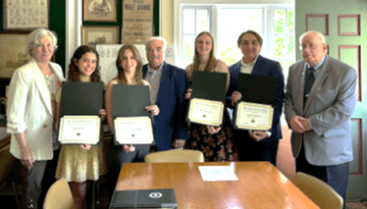 UCHS 2023 Student Award winners from Union, Linden, and Cranford High Schools holding certificates of recognition.
